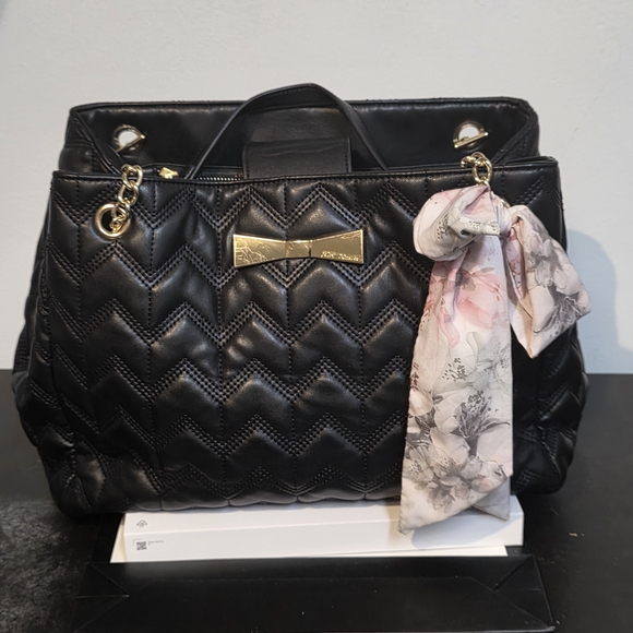 Betsey Johnson Handbags - Betsey Johnson Black Quilted Shoulder Bag with Floral Accent